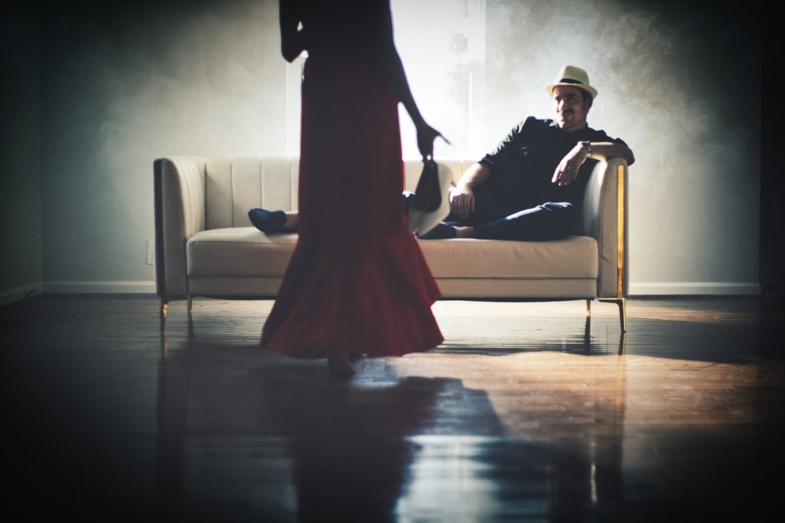 Color photograph of MrMrs Marciano in a warm interior